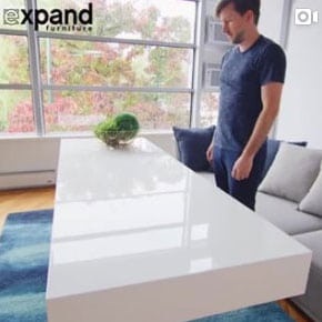 Transforming white table at expand furniture